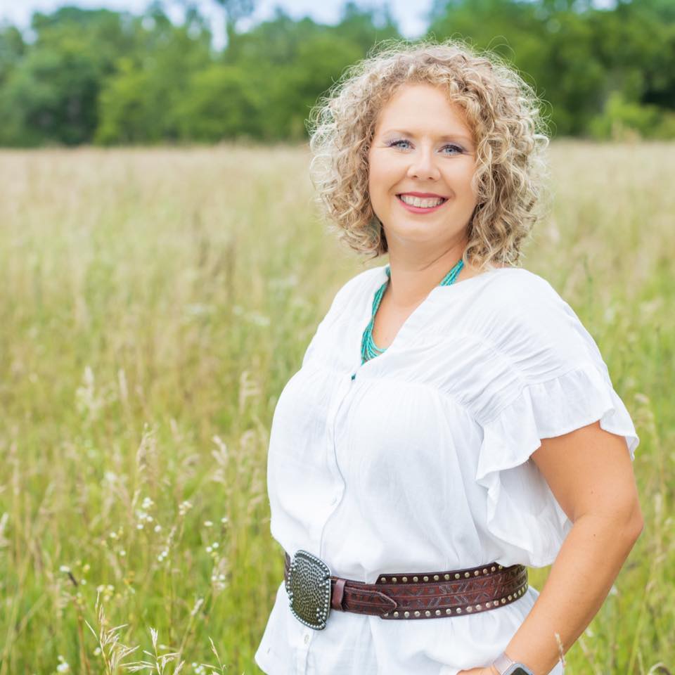 Emma Hohenberger in a field of fescue